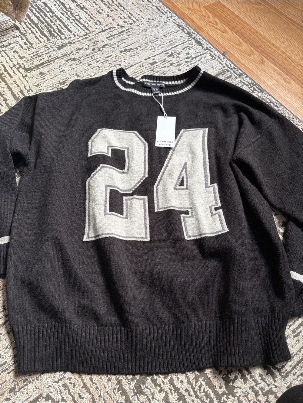 Freestyle Black Knit Sweater with 24 Applique